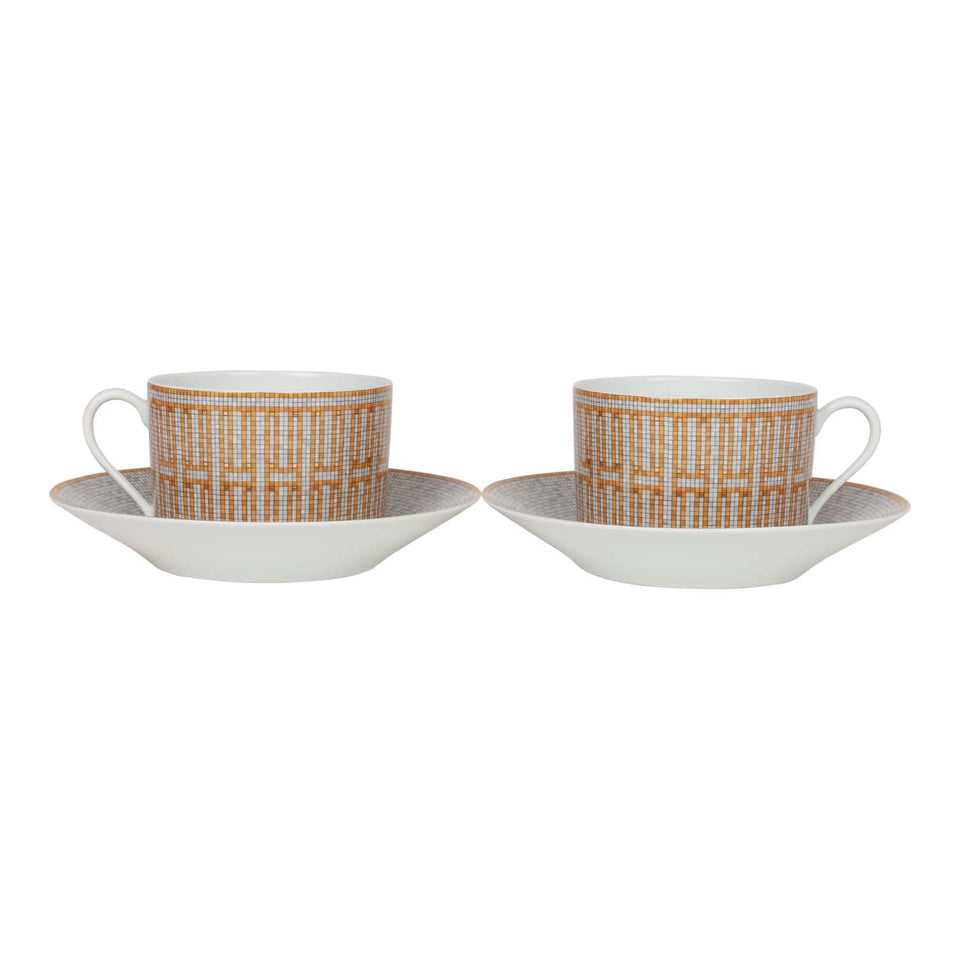 Hermes "Mosaique Au 24" Gold Porcelain Tea Cup and Saucer Set