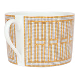Hermes "Mosaique Au 24" Gold Porcelain Tea Cup and Saucer Set
