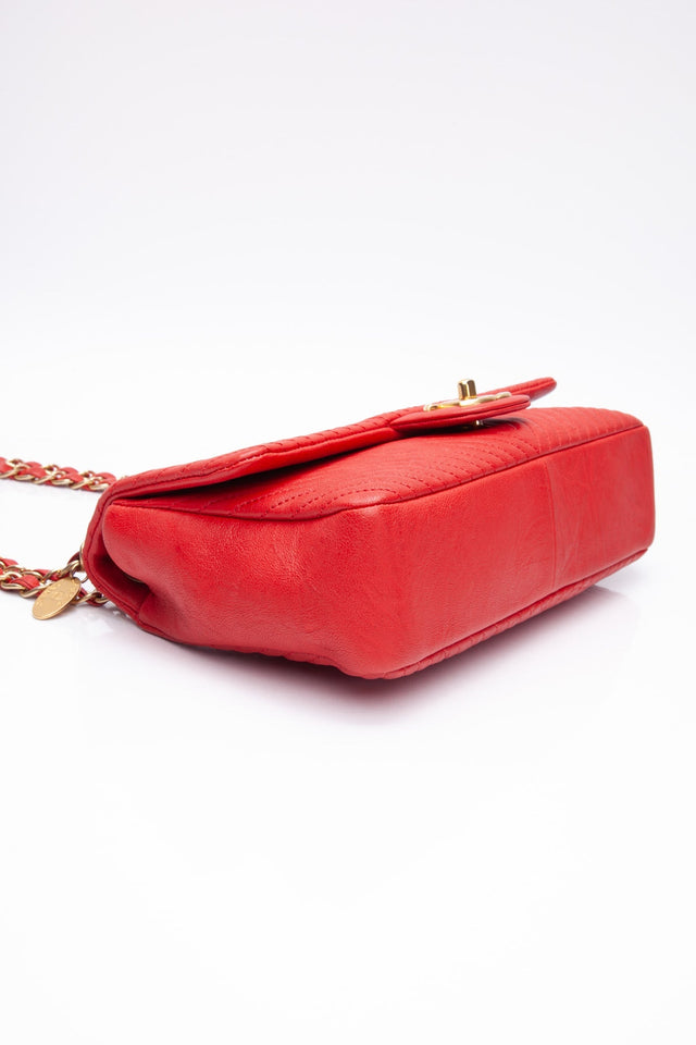 CHANEL Red Medallion Charm Chevron Wrinkled Calfskin Medium Flap Bag