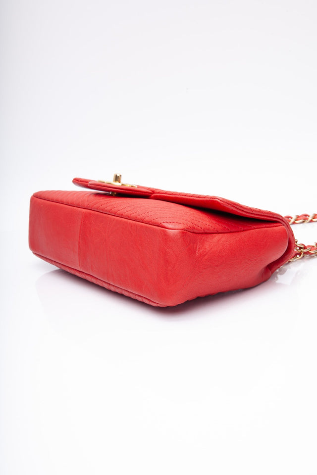 CHANEL Red Medallion Charm Chevron Wrinkled Calfskin Medium Flap Bag