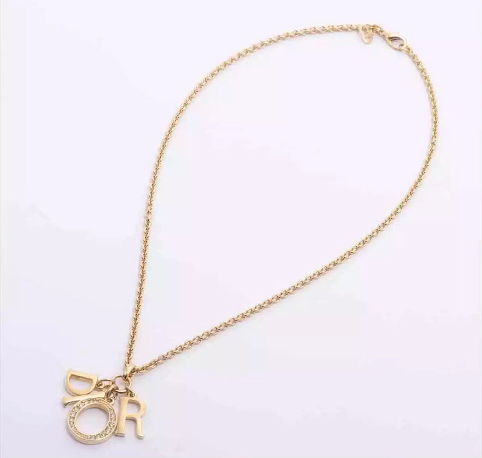 Christian Dior Large Dangle Rhinestone NIB Gold Necklace
