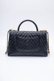 CHANEL Black Chevron Quilted Medium Coco Handle Flap Bag