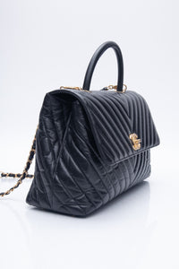 CHANEL Black Chevron Quilted Medium Coco Handle Flap Bag