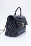 CHANEL Black Chevron Quilted Medium Coco Handle Flap Bag