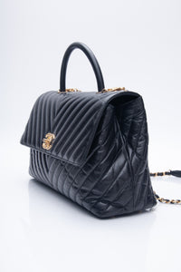 CHANEL Black Chevron Quilted Medium Coco Handle Flap Bag