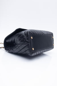 CHANEL Black Chevron Quilted Medium Coco Handle Flap Bag