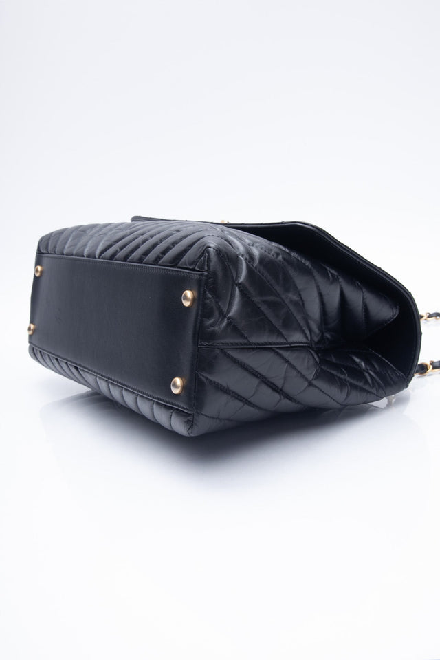 CHANEL Black Chevron Quilted Medium Coco Handle Flap Bag