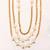 CHANEL Triple Pearl Long Chain Necklace