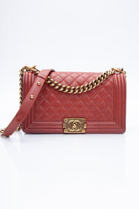 CHANEL Dark Orange Caviar Quilted Medium Boy Flap Bag