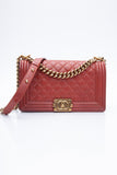 CHANEL Dark Orange Caviar Quilted Medium Boy Flap Bag