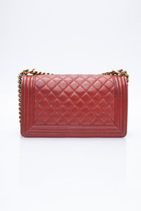 CHANEL Dark Orange Caviar Quilted Medium Boy Flap Bag