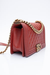 CHANEL Dark Orange Caviar Quilted Medium Boy Flap Bag
