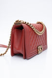 CHANEL Dark Orange Caviar Quilted Medium Boy Flap Bag