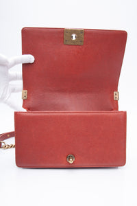 CHANEL Dark Orange Caviar Quilted Medium Boy Flap Bag