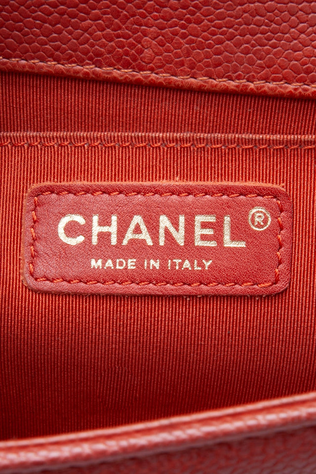 CHANEL Dark Orange Caviar Quilted Medium Boy Flap Bag
