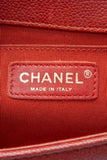 CHANEL Dark Orange Caviar Quilted Medium Boy Flap Bag