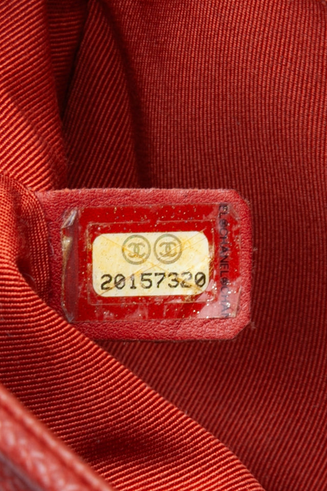 CHANEL Dark Orange Caviar Quilted Medium Boy Flap Bag