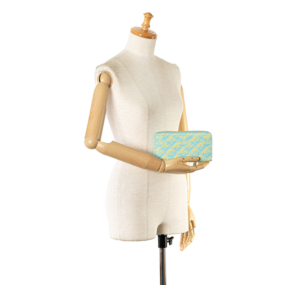 Blue Louis Vuitton Monogram Empreinte Summer Stardust Zippy Wallet
