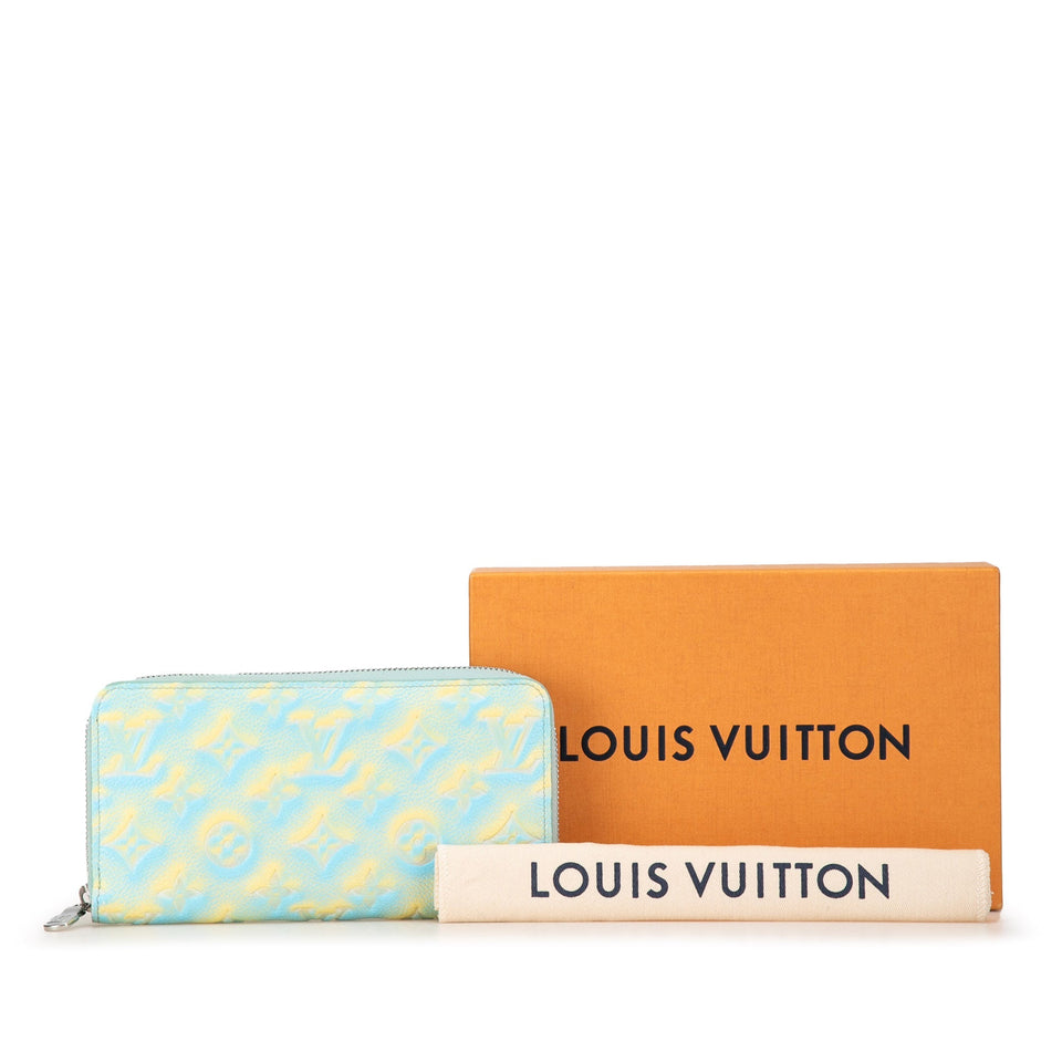 Blue Louis Vuitton Monogram Empreinte Summer Stardust Zippy Wallet