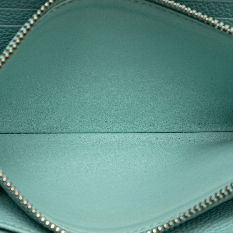 Blue Louis Vuitton Monogram Empreinte Summer Stardust Zippy Wallet