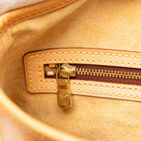 Brown Louis Vuitton Nomade Petit Bucket