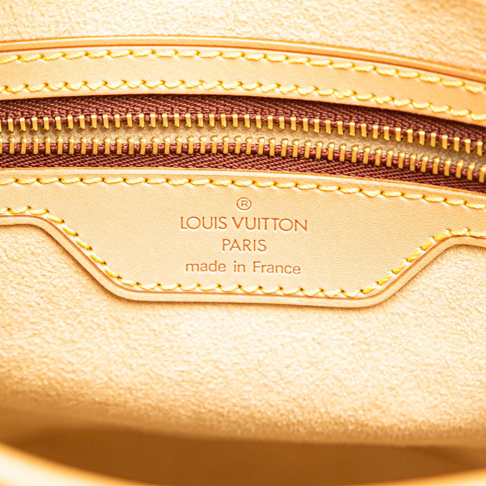 Tan Louis Vuitton Nomade Petit Bucket