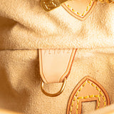 Tan Louis Vuitton Nomade Petit Bucket