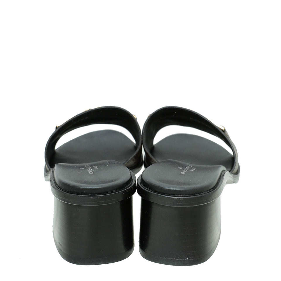 Louis Vuitton Monogram Lock It Mules 37.5