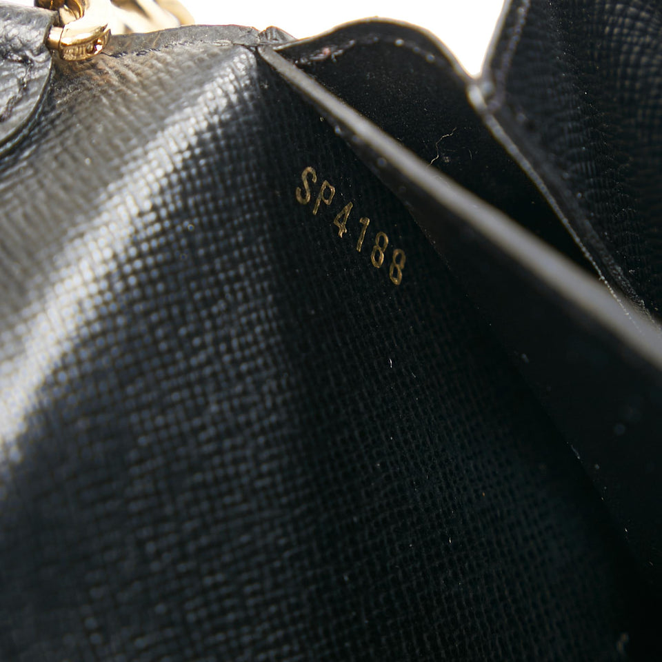 Louis Vuitton Epi Twist Love Lock Chain Wallet (SHG-MmYcl0)