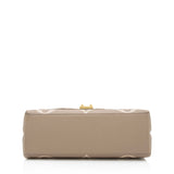 Louis Vuitton Giant Monogram Empreinte Madeleine MM Top Handle Bag (SHF-yODfGB)