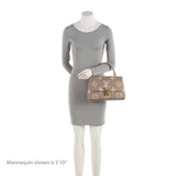 Louis Vuitton Giant Monogram Empreinte Madeleine MM Top Handle Bag (SHF-yODfGB)