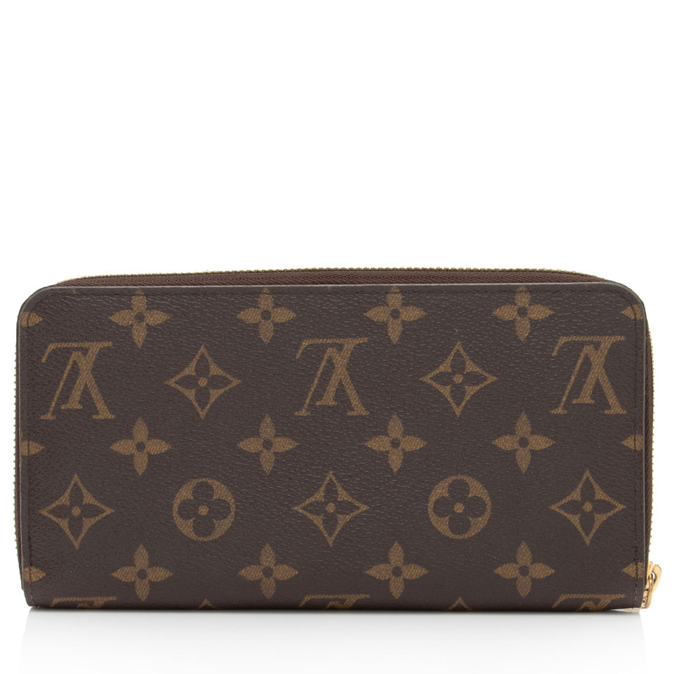 Louis Vuitton Limited Edition Monogram Canvas Animation Transatlantic Zippy Wallet (SHF-xi7jMF)