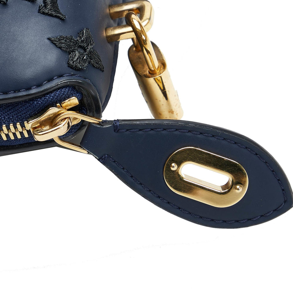 Louis Vuitton Monogram Addiction Lockit Vertical MM (SHG-AMrldH)