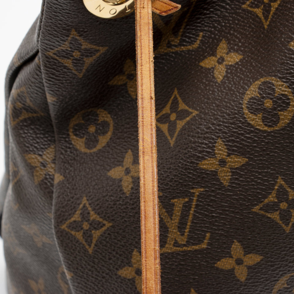 Louis Vuitton Monogram Canvas Artsy MM Shoulder Bag (SHF-DzYiz3)