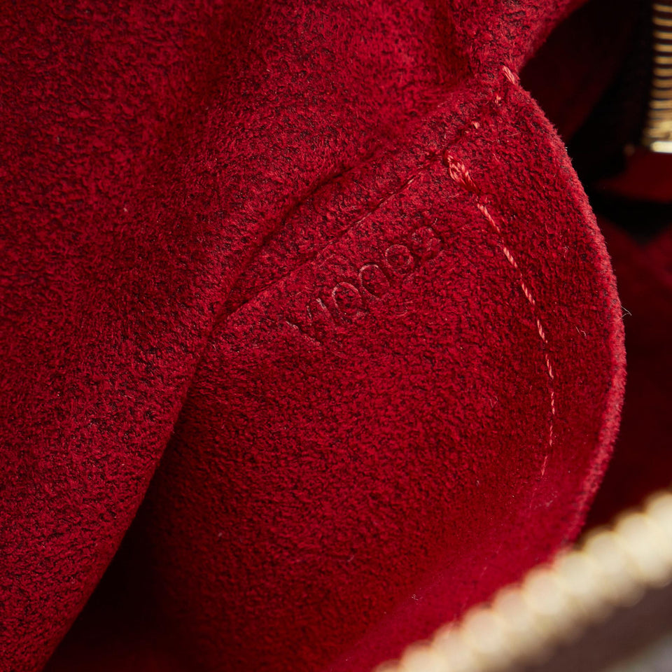 Louis Vuitton Monogram Excentri-Cite (SHG-SgdKMe)