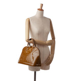 Louis Vuitton Monogram Vernis Alma PM (SHG-9nUVc0)