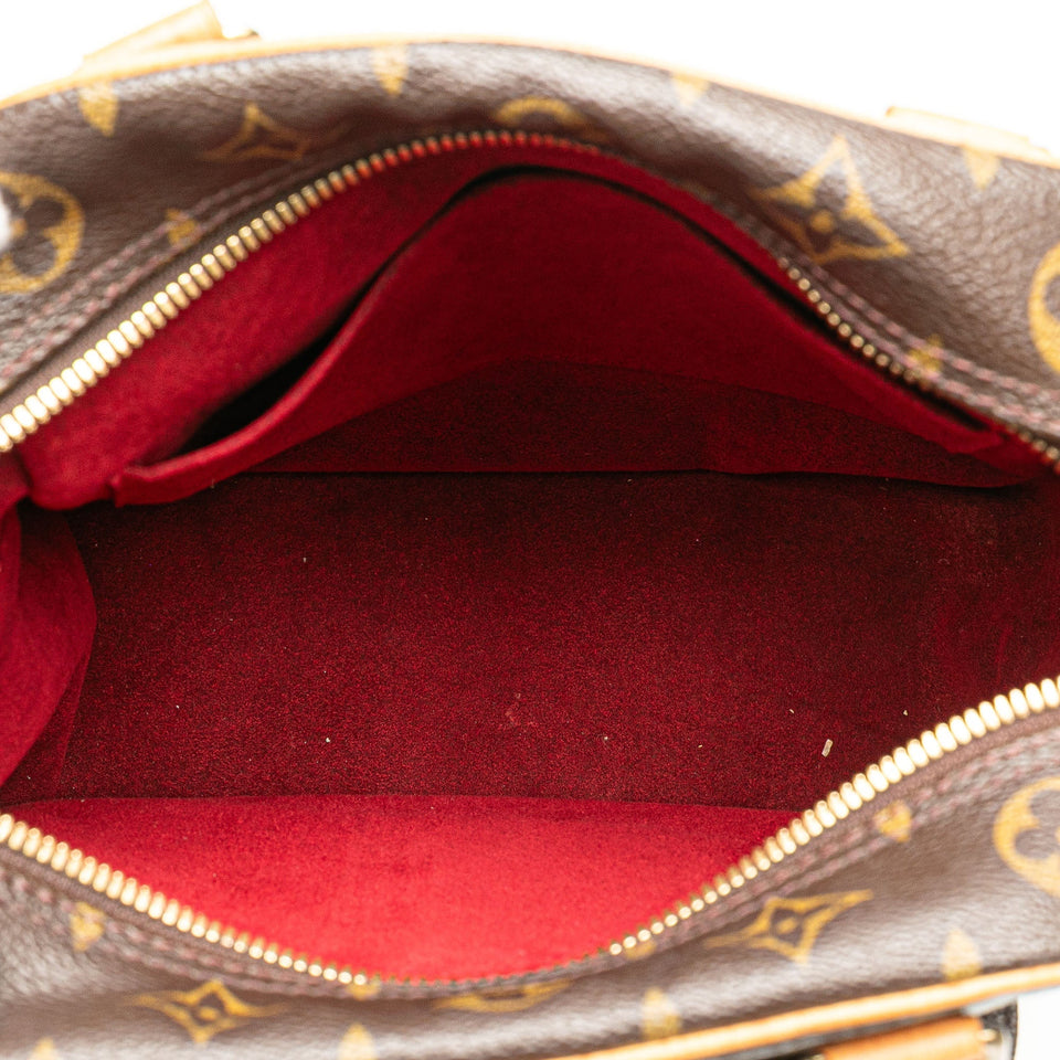 Brown Louis Vuitton Monogram Excentri-Cite Handbag