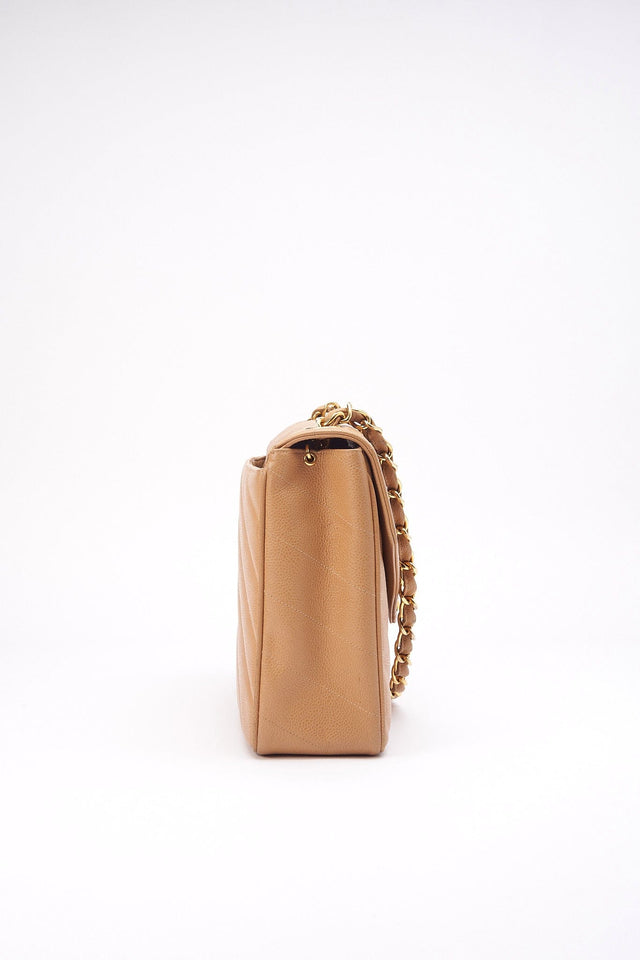 Chanel Jumbo Classic Flap Bag in Caviar Beige Leather
