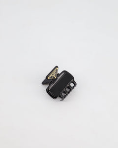 Prada Black Enameled Metal Claw Hair Clip with Gold Triangle Logo Plaque