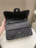 Chanel Classic Quilted Jumbo Double Flap Black Caviar