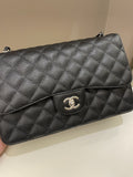 Chanel Classic Quilted Jumbo Double Flap Black Caviar