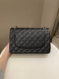 Chanel Classic Quilted Jumbo Double Flap Black Caviar