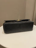 Chanel Classic Quilted Jumbo Double Flap Black Caviar