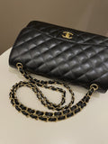 Chanel Classic Quilted Jumbo Double Flap Black Caviar