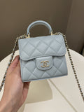 Chanel 22P Top Handle Clutch On Chain Baby Blue Lambskin