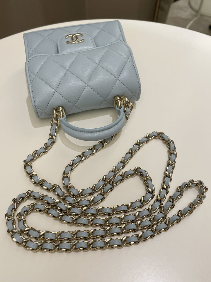 Chanel 22P Top Handle Clutch On Chain Baby Blue Lambskin