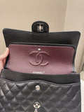 Chanel Classic Quilted Medium Double Flap Black Caviar
