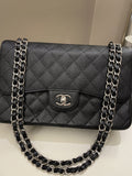 Chanel Classic Quilted Jumbo Double Flap Black Caviar