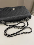Chanel Classic Quilted Jumbo Double Flap Black Caviar