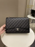 Chanel Classic Quilted Maxi Single Flap Black Caviar